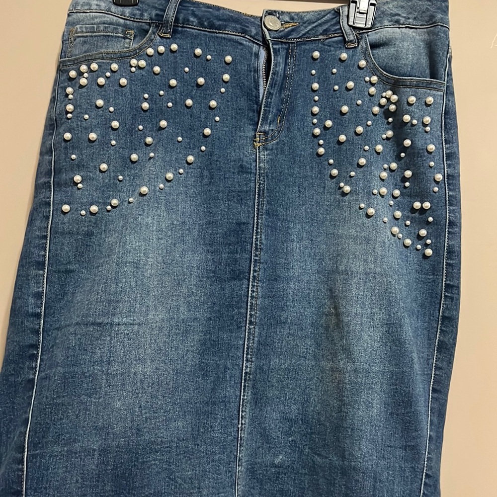 Beautiful jean style dress with embellished pockets. Size large.